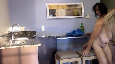 mother penetrated in kitchen gets a cum shot on her huge tits