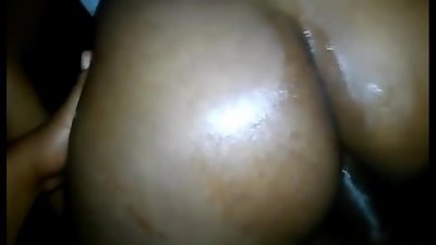 ebony woman sitting cozily on a cock.