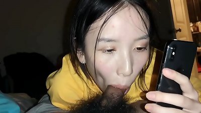 korean couple while chatting phone with her mum